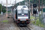 NJT 4555 leads a train out of the yard